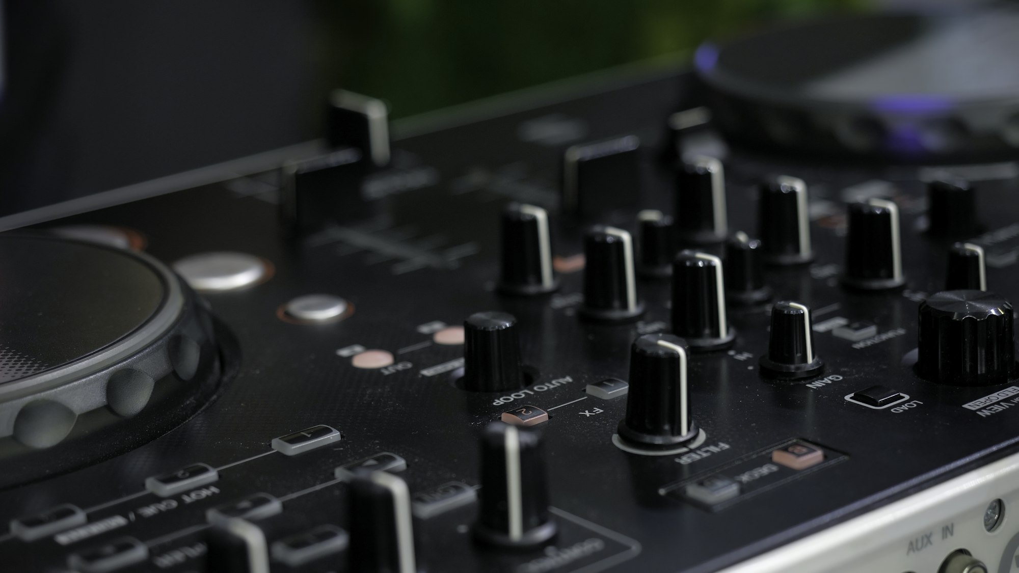 Man in sound studio working with sound mixer console. Media. DJ hands and sound machine, music